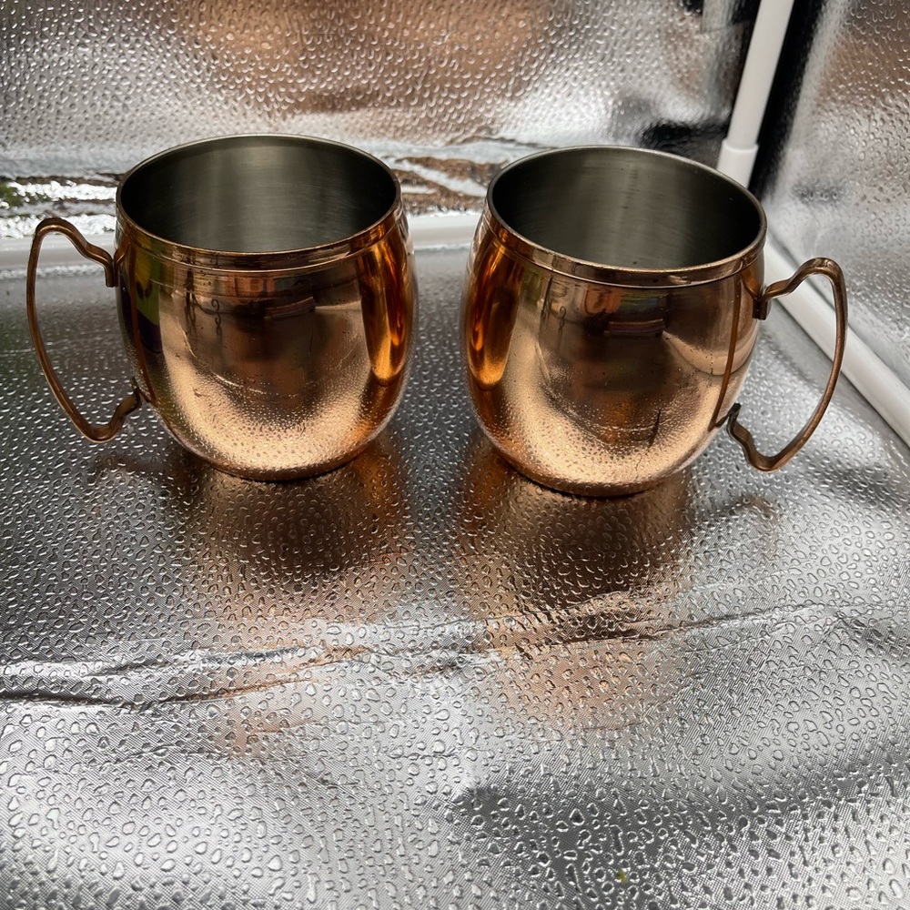 Set of 2 Brass Mugs.